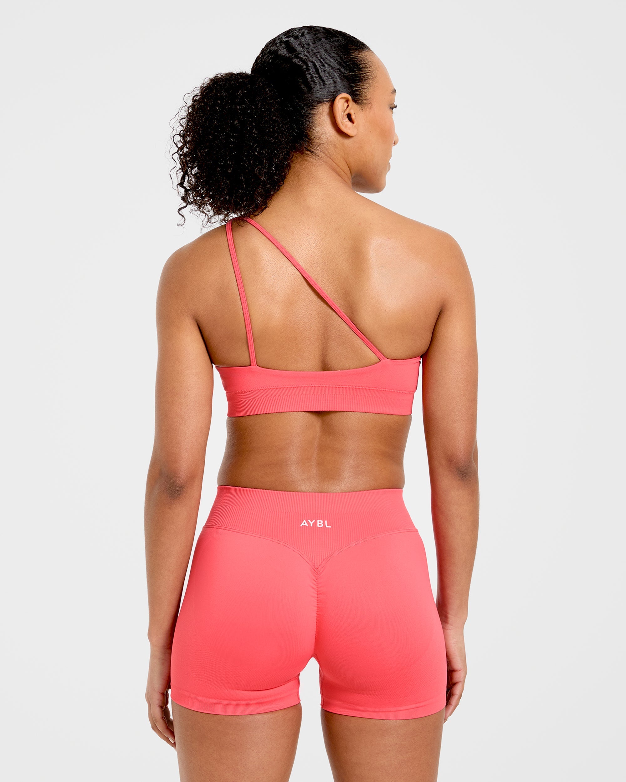 Enhance Seamless One Shoulder Sports Bra - Summer Coral