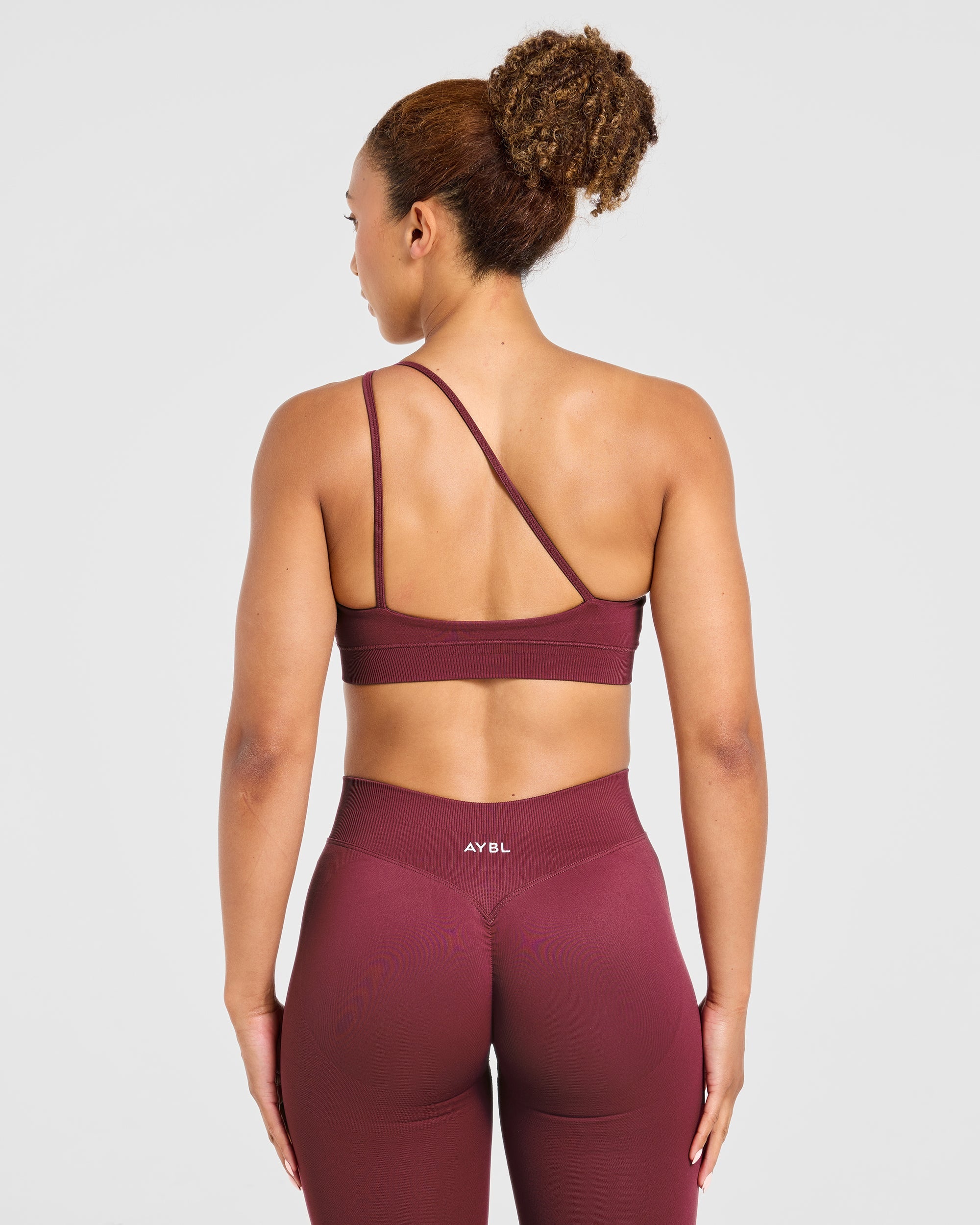 Enhance Seamless One Shoulder Sports Bra - Mahogany Red