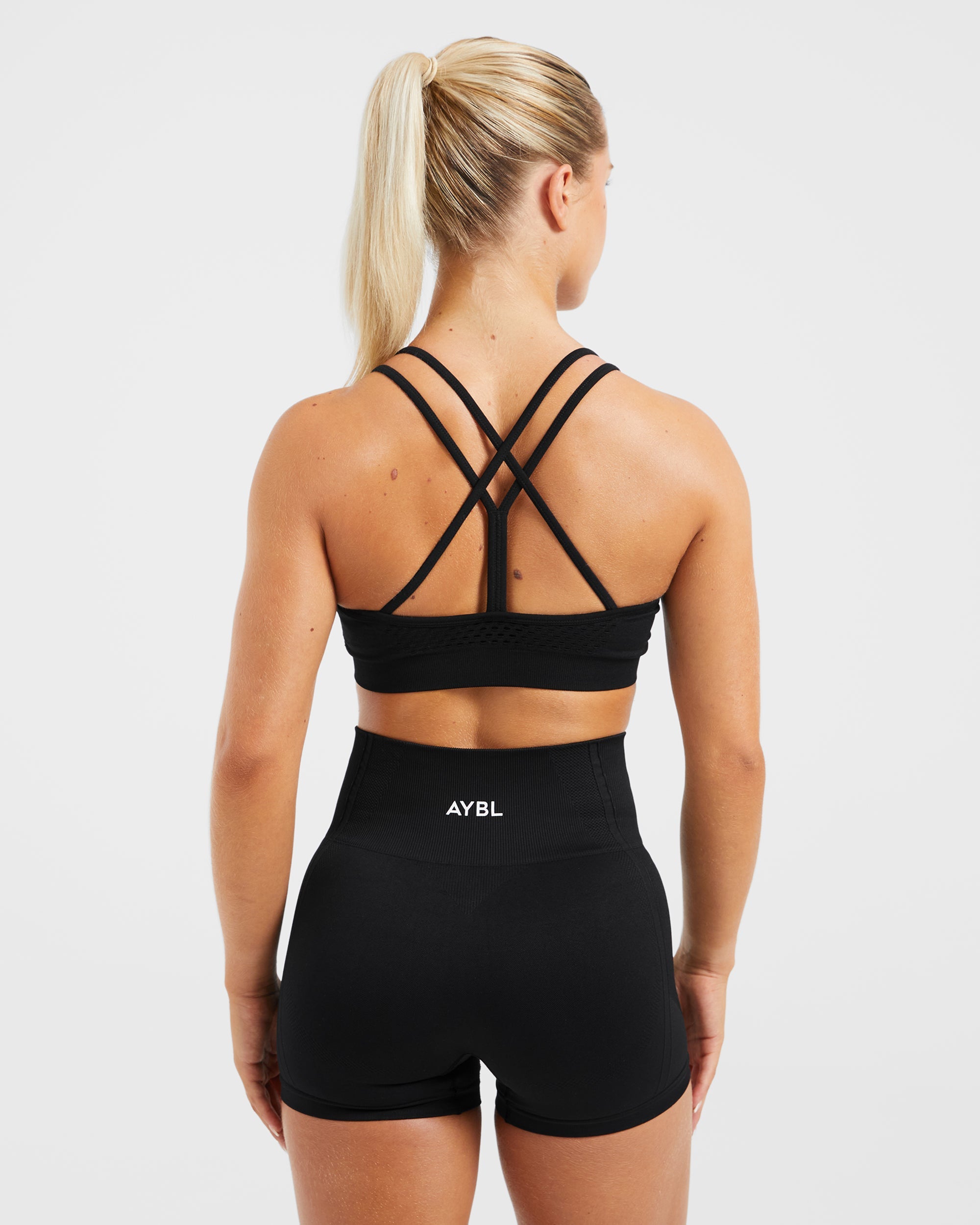 Soutien-gorge de sport à bretelles sans couture Essential - Noir