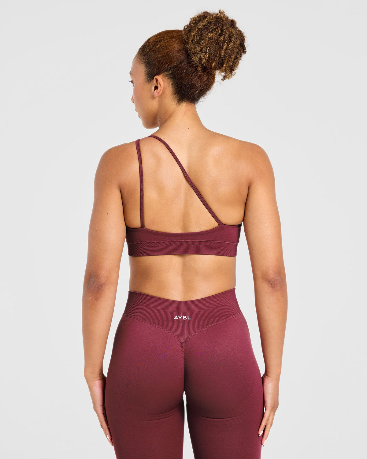 Enhance Seamless One Shoulder Sports Bra - Mahogany Red