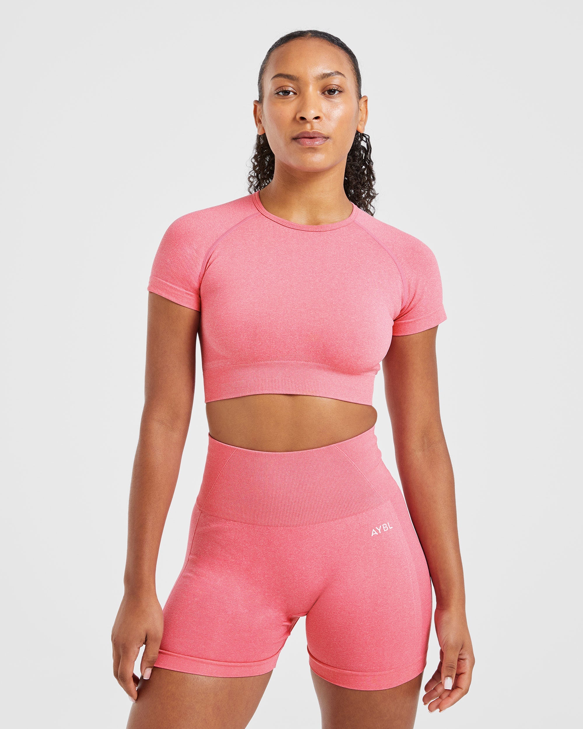 Nahtloses Empower-Crop-Top – Rosa meliert