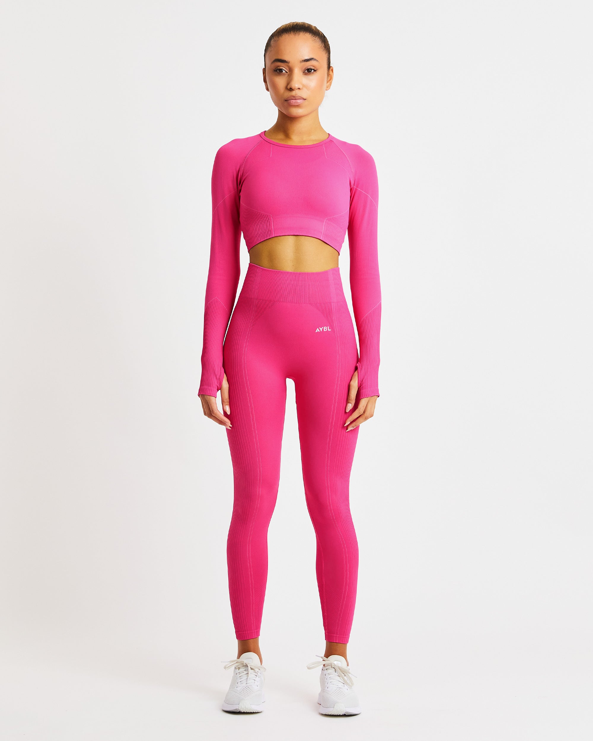 Nahtloses, langärmliges Reflex-Crop-Top – Fuchsia Pink