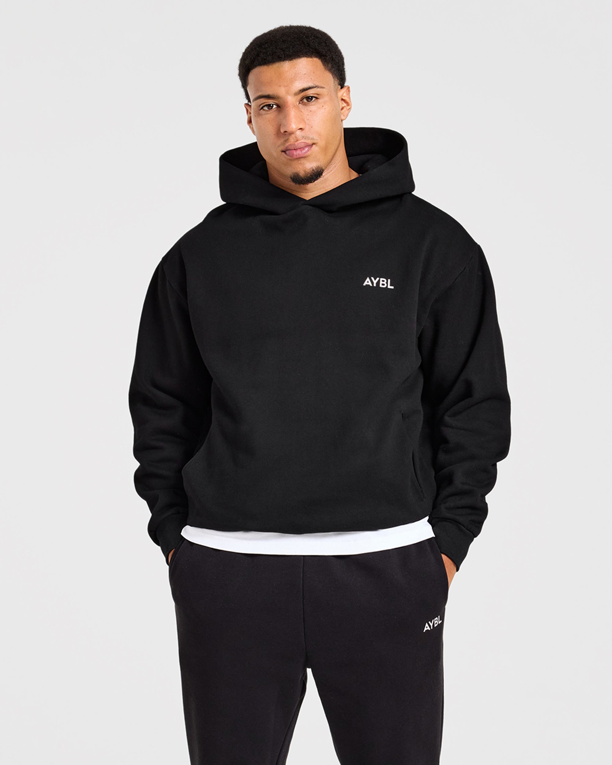 Essential übergroßer Kapuzenpullover – Schwarz