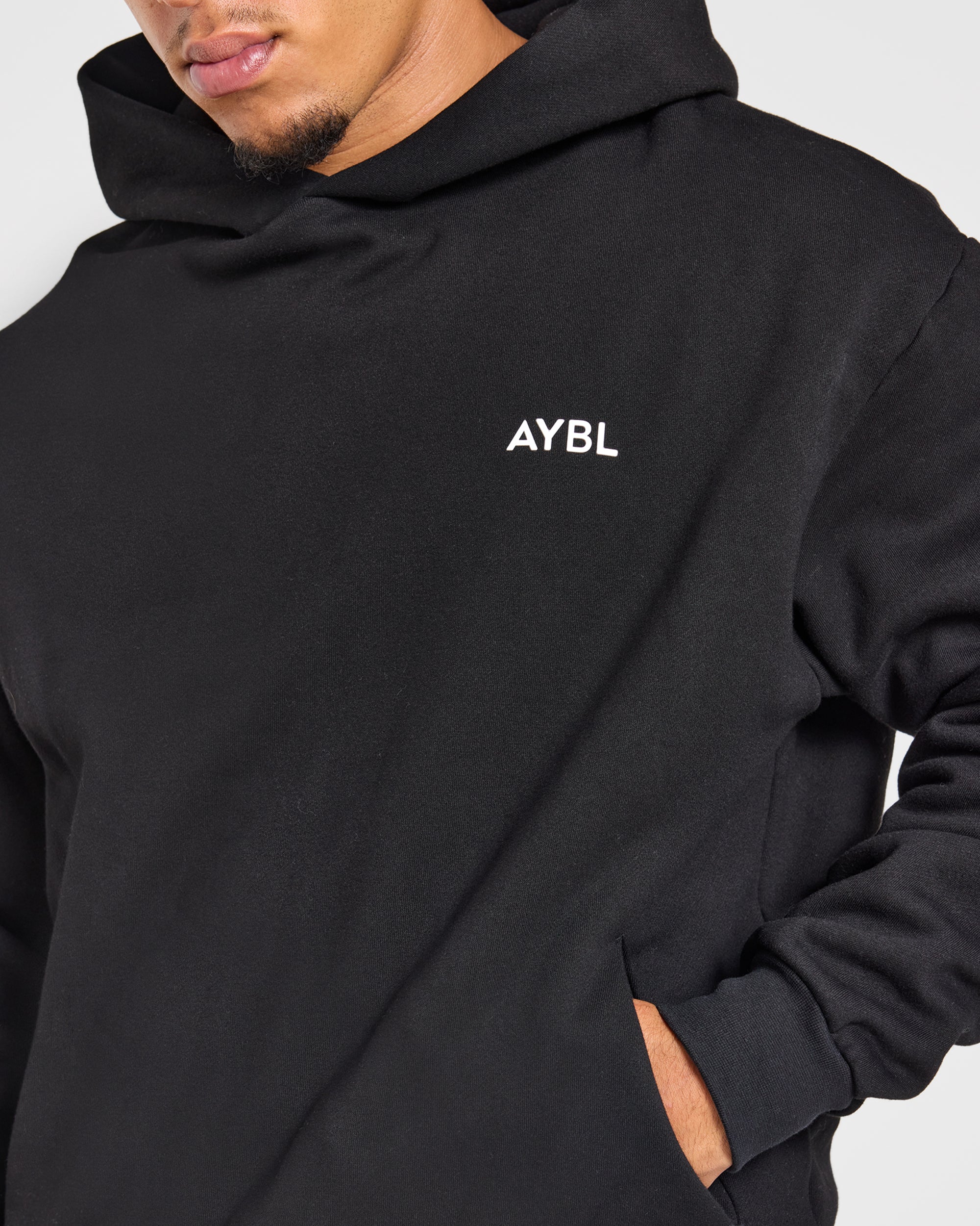 Essential übergroßer Kapuzenpullover – Schwarz