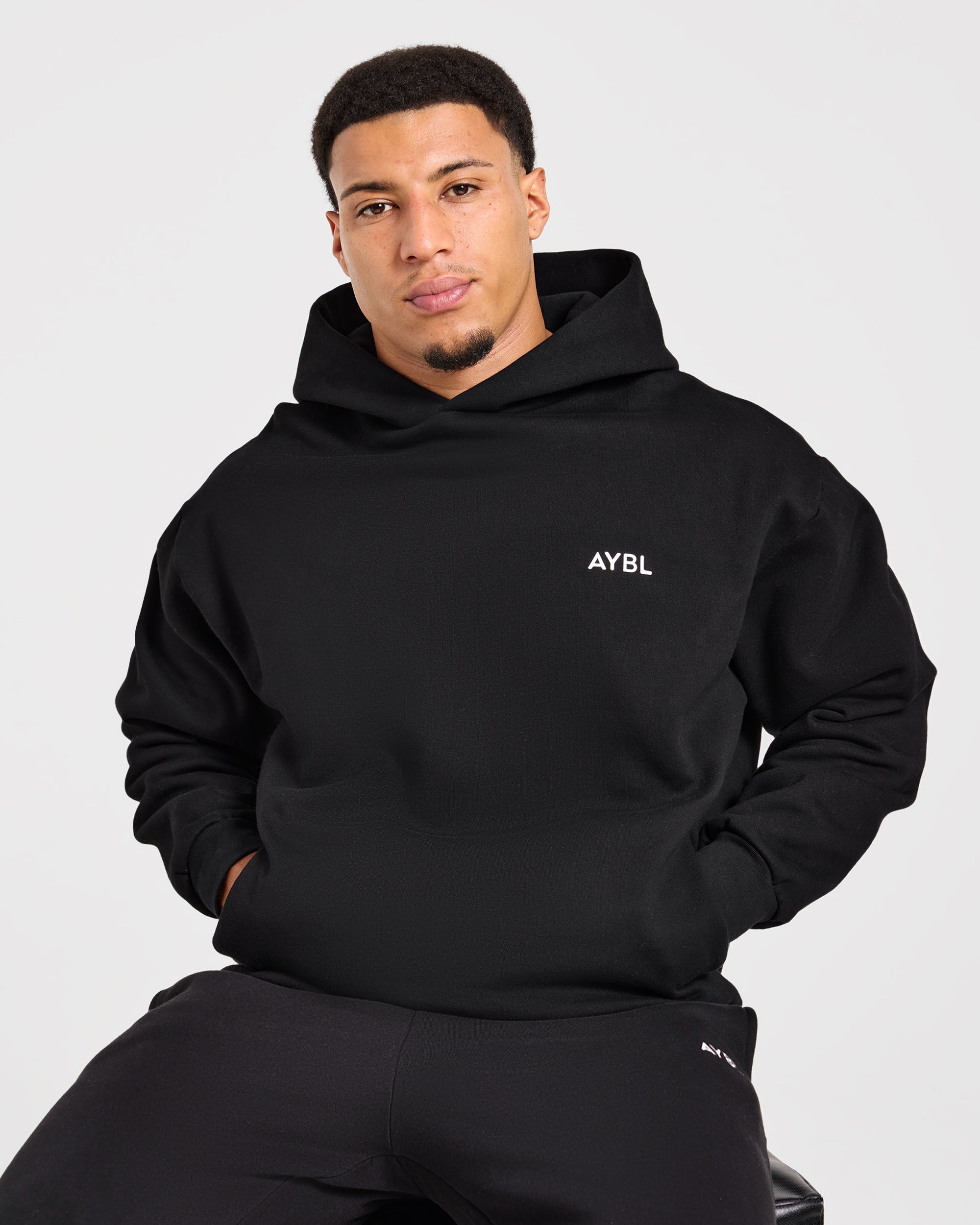 Essential übergroßer Kapuzenpullover – Schwarz