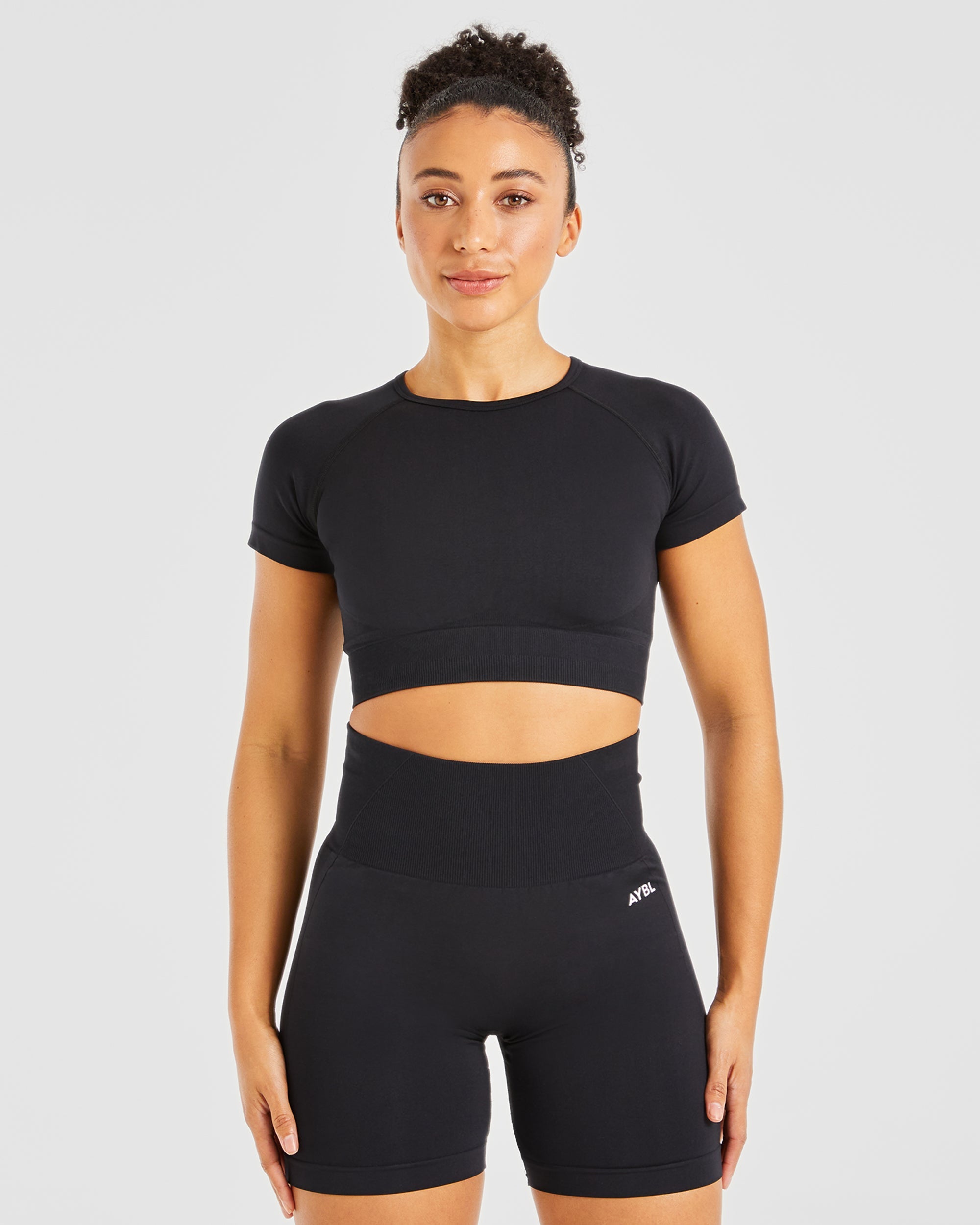 Nahtloses Empower-Crop-Top – Schwarz