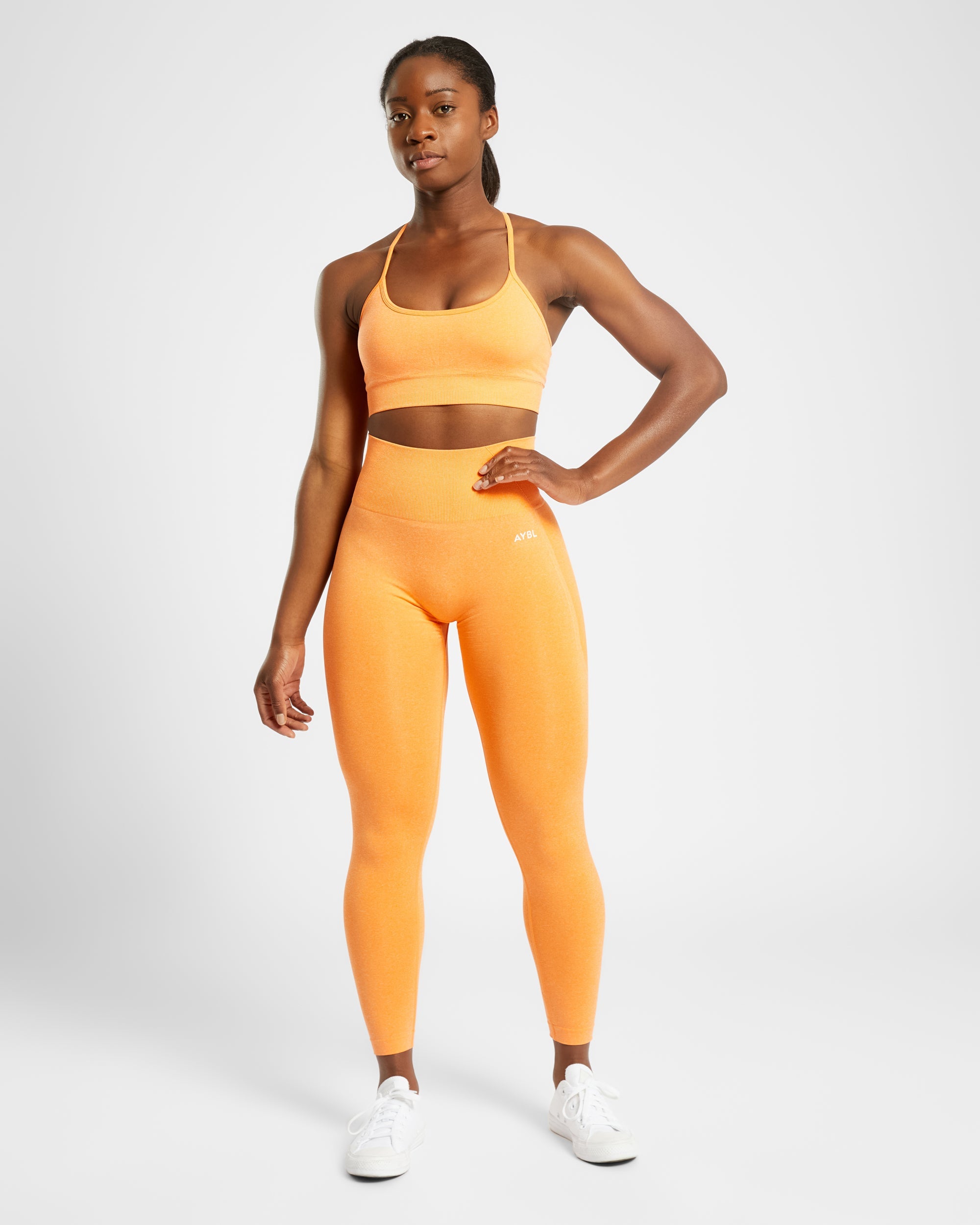 Nahtlose Leggings „Empower“ – Orange meliert