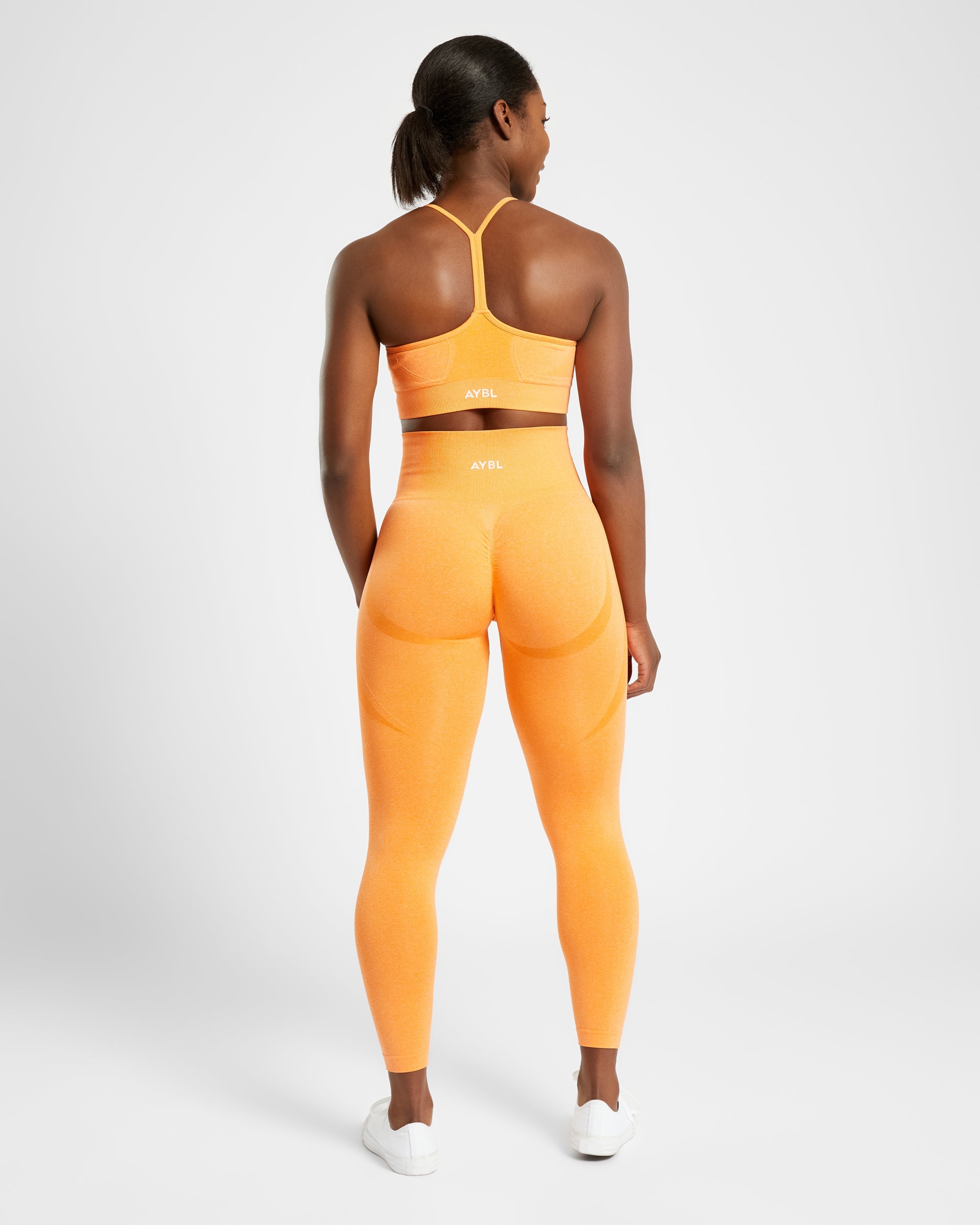 Nahtlose Leggings „Empower“ – Orange meliert