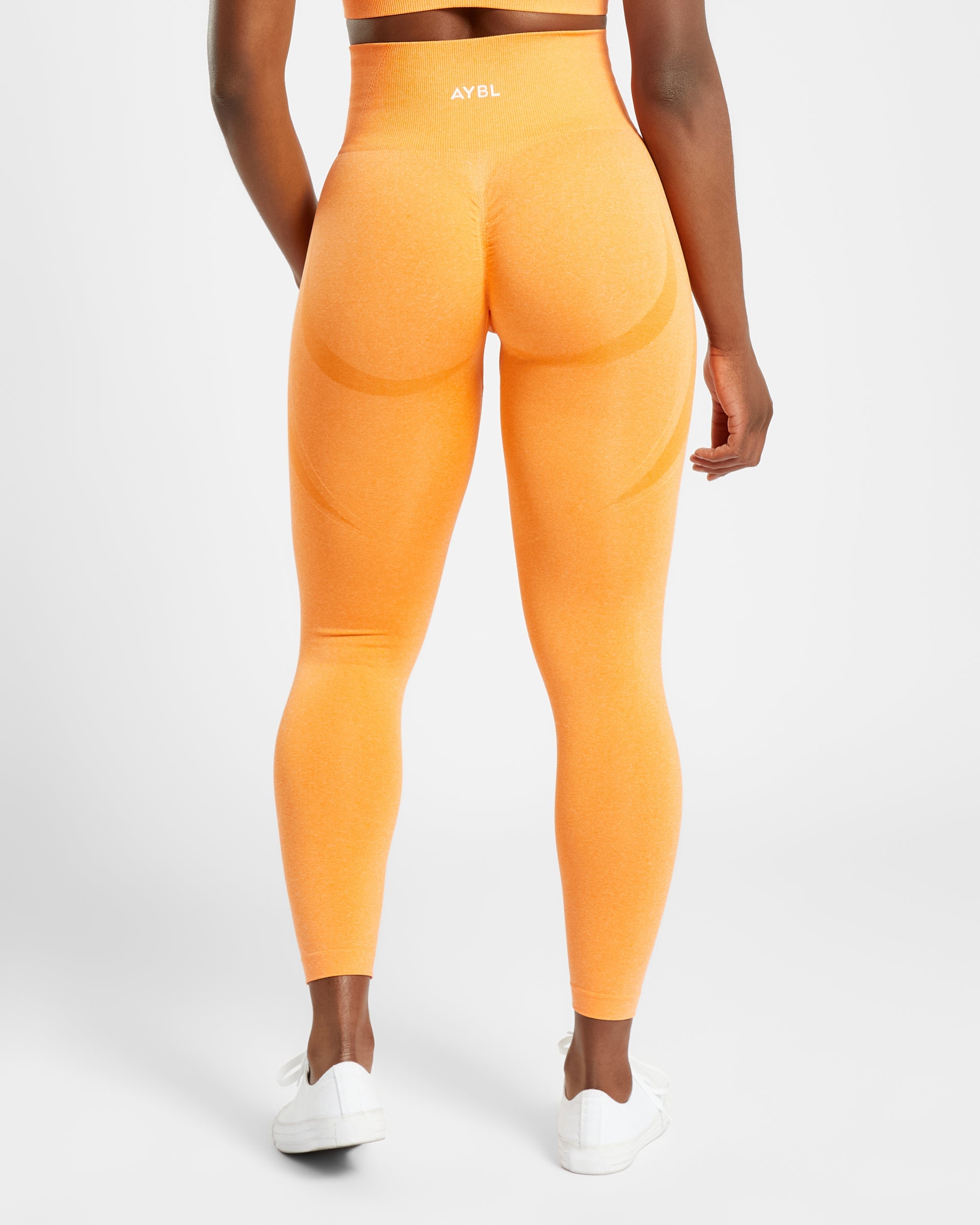 Nahtlose Leggings „Empower“ – Orange meliert