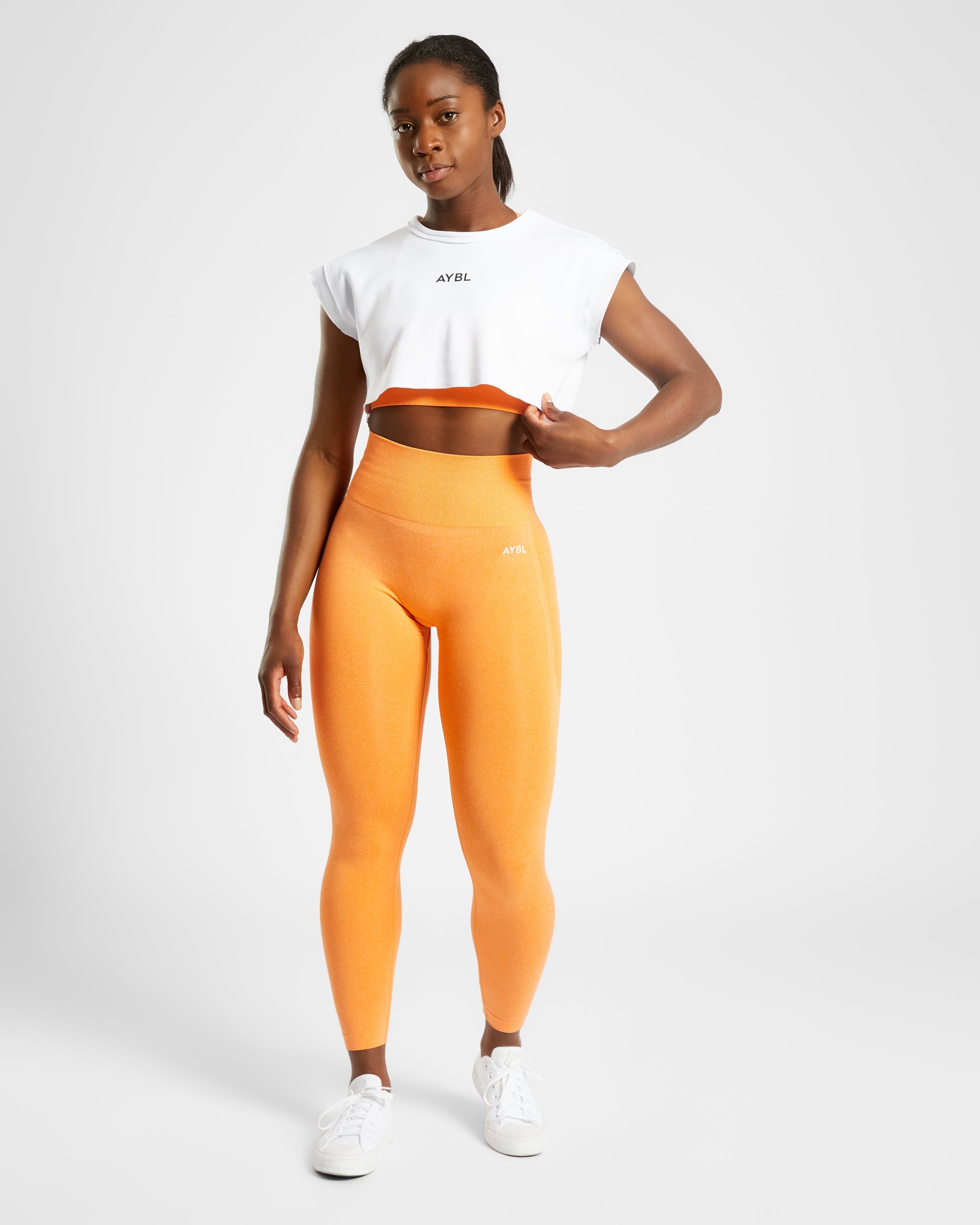 Nahtlose Leggings „Empower“ – Orange meliert