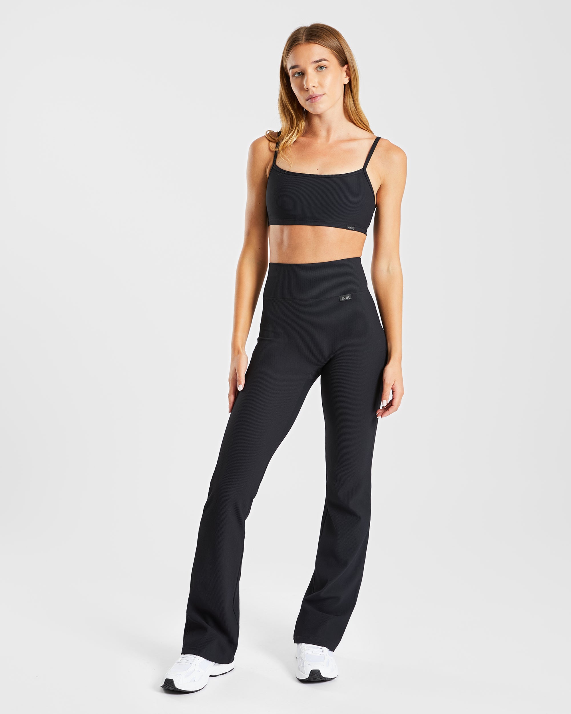 Gerippte, ausgestellte Leggings „Sculpt“ - Schwarz