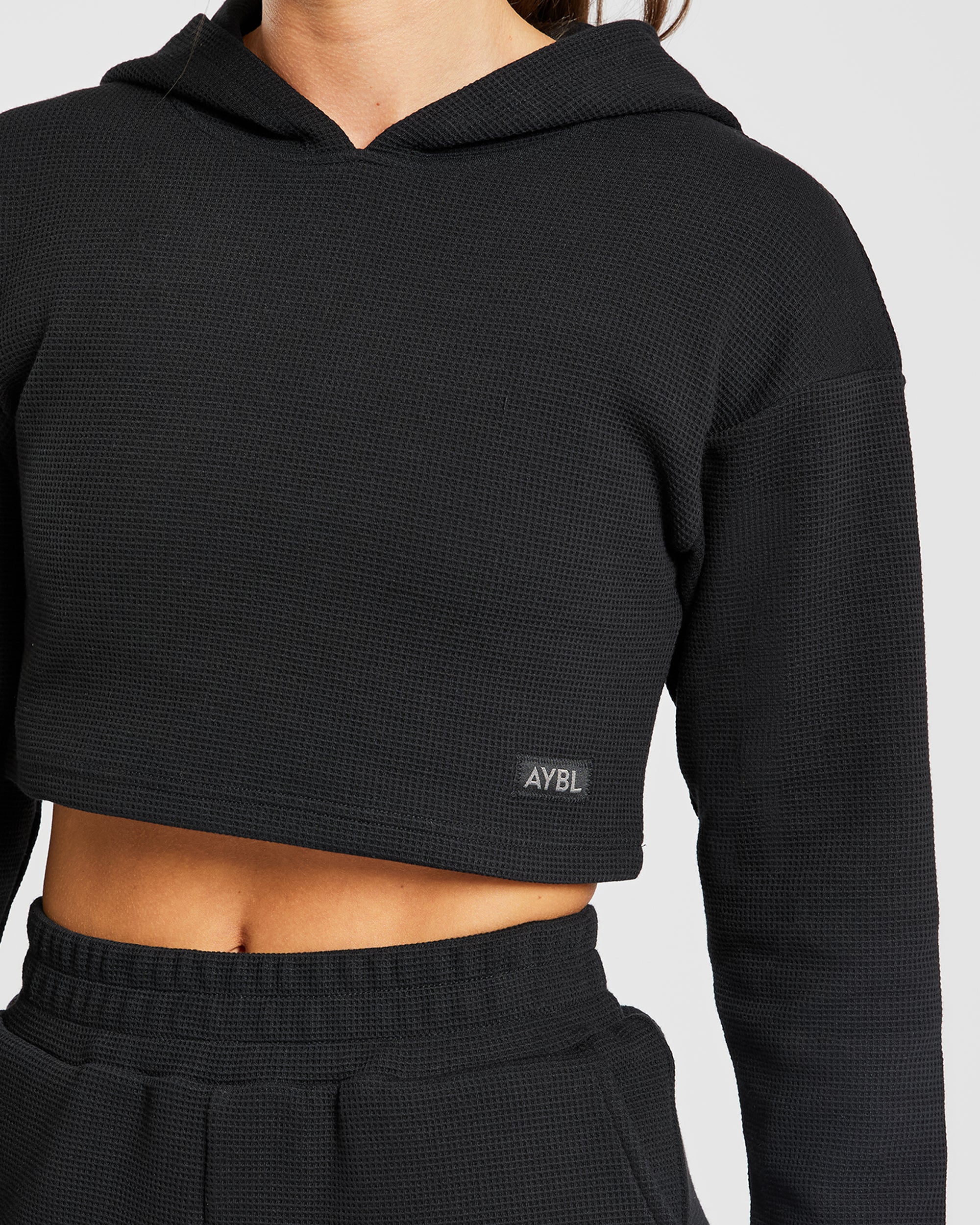 Waffel-Crop-Hoodie – Schwarz