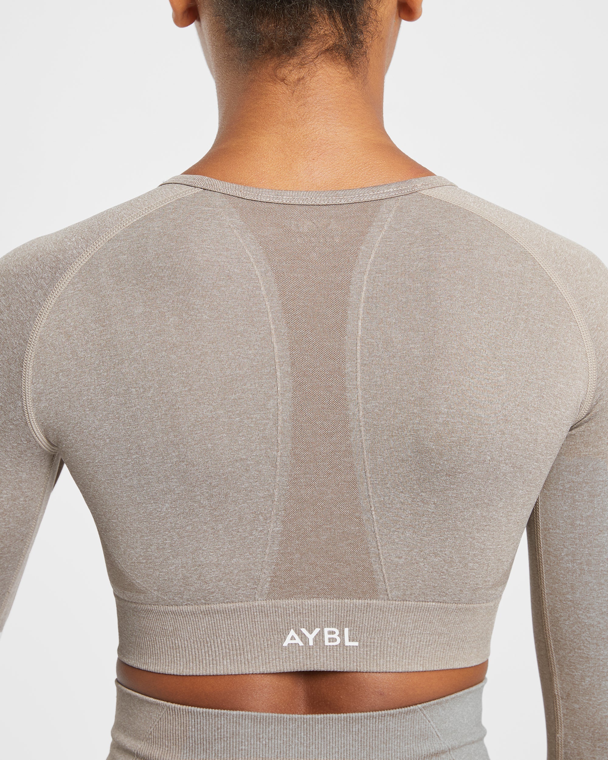 Nahtloses, langärmliges Crop-Top „Empower“ – Taupe meliert