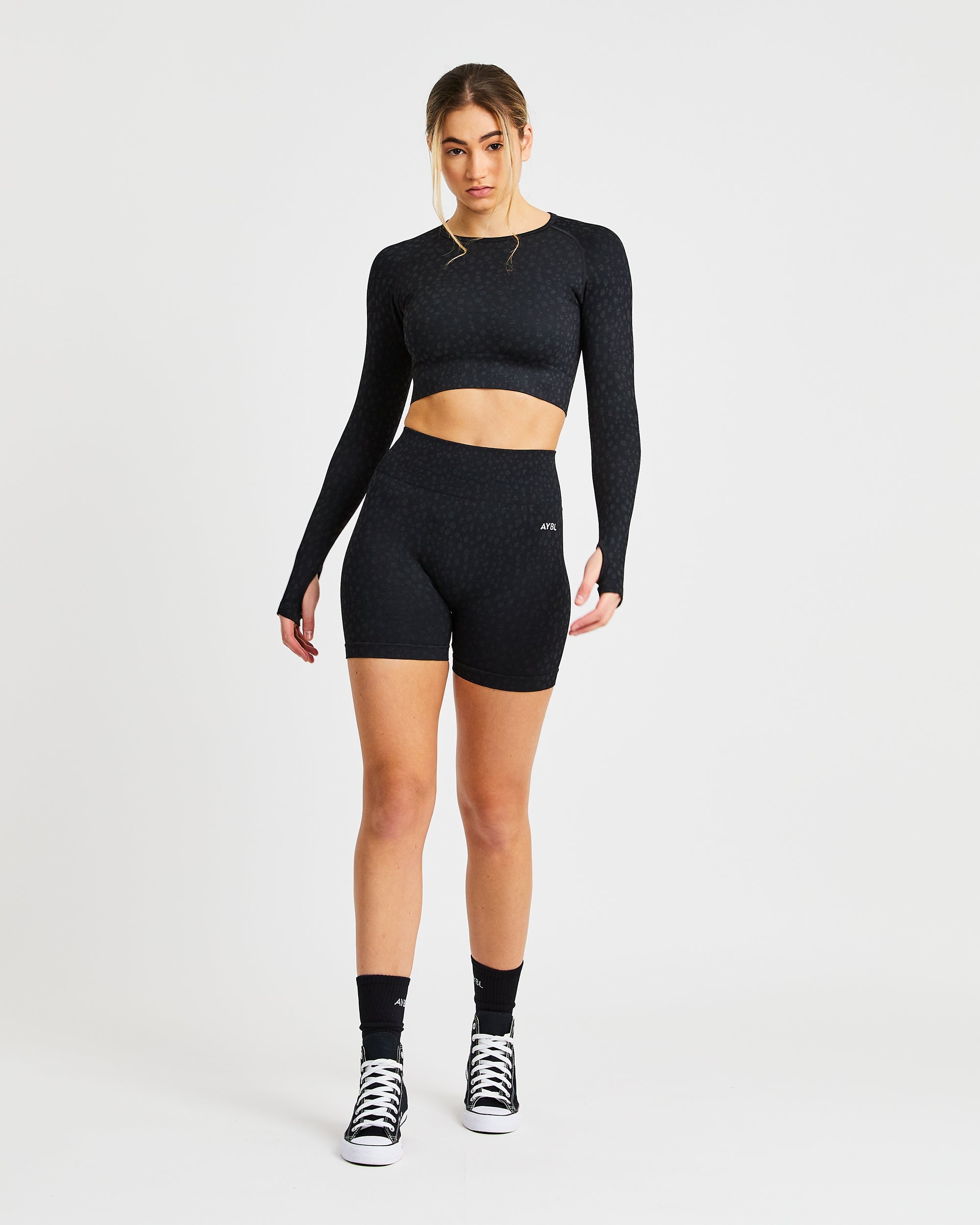Evolve Speckle Seamless Langarm-Crop-Top – Schwarz
